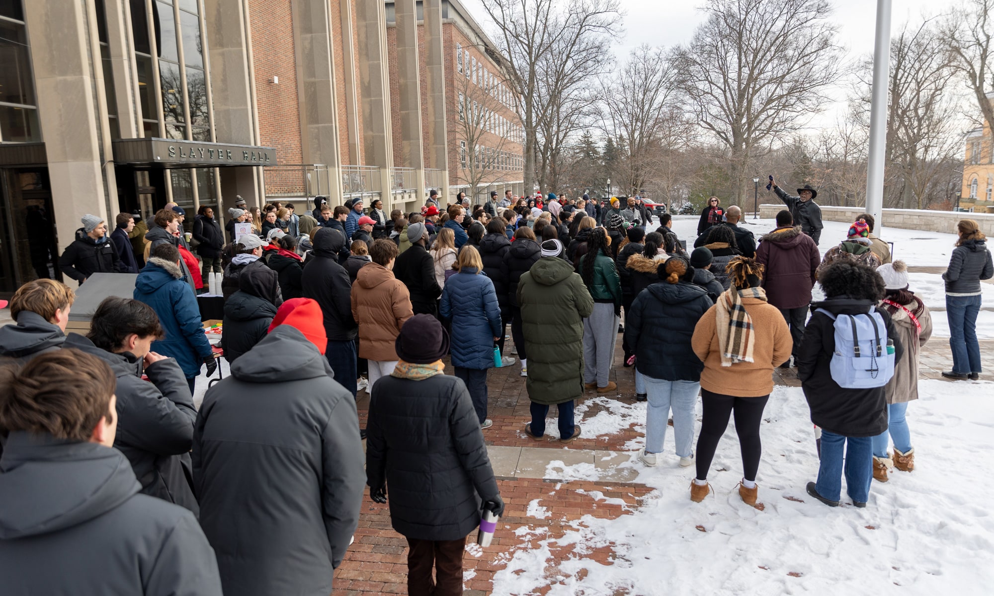 Students, faculty, and staff assemble outside Slayter Hall for the march to Mitchell Center as part of Denison’s Martin Luther King Jr. celebration.