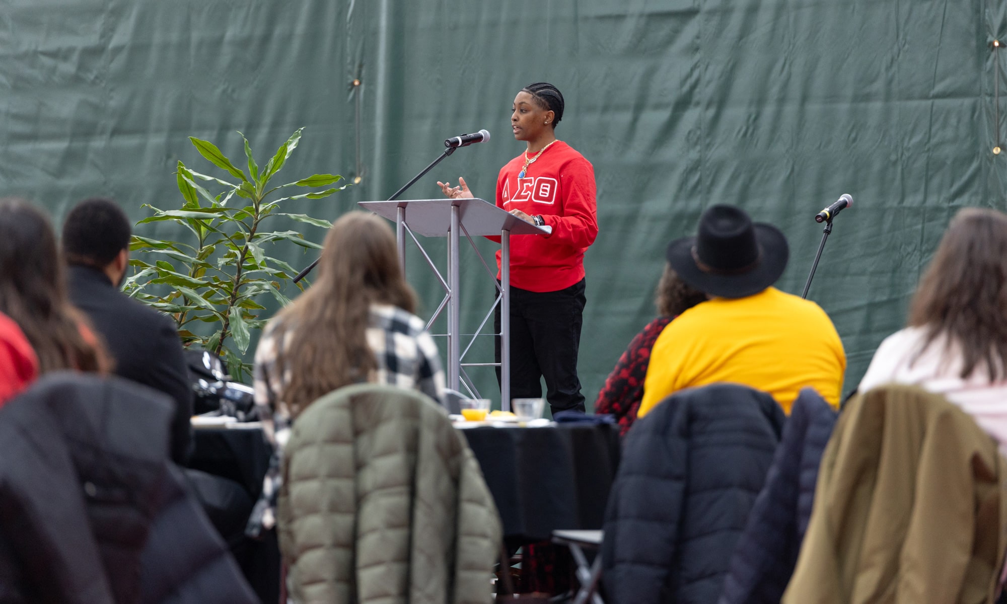 Kiara Ansley-Hinds ’24, president of the National Pan-Hellenic Council, speaks to the importance of Martin Luther King Jr.