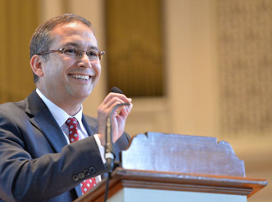 Adam Weinberg speaking at a podium