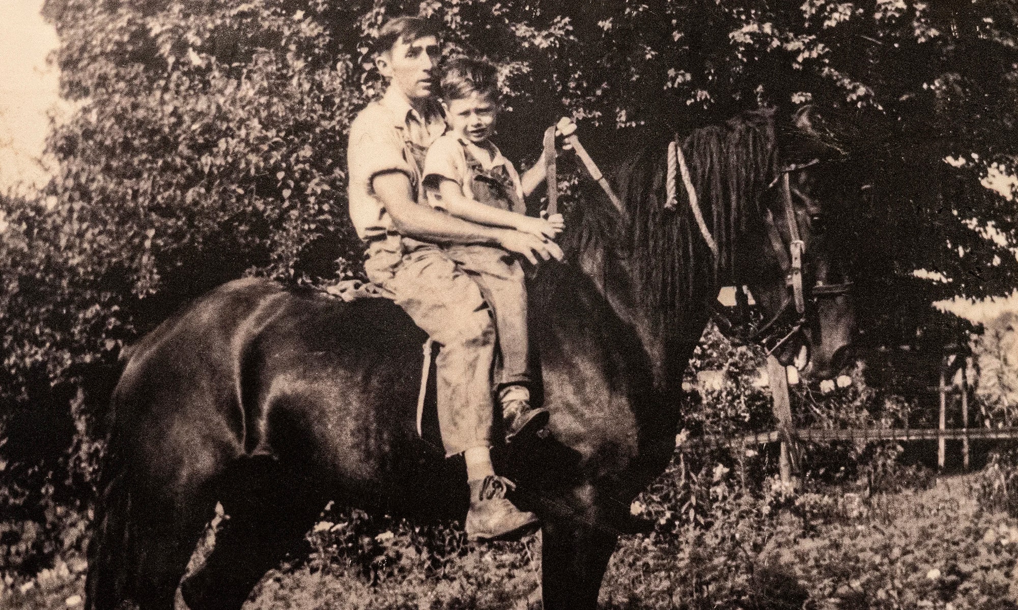 Wayne and Hal Burlingame share a ride. Photo credit: Reclaiming our Heritage collection